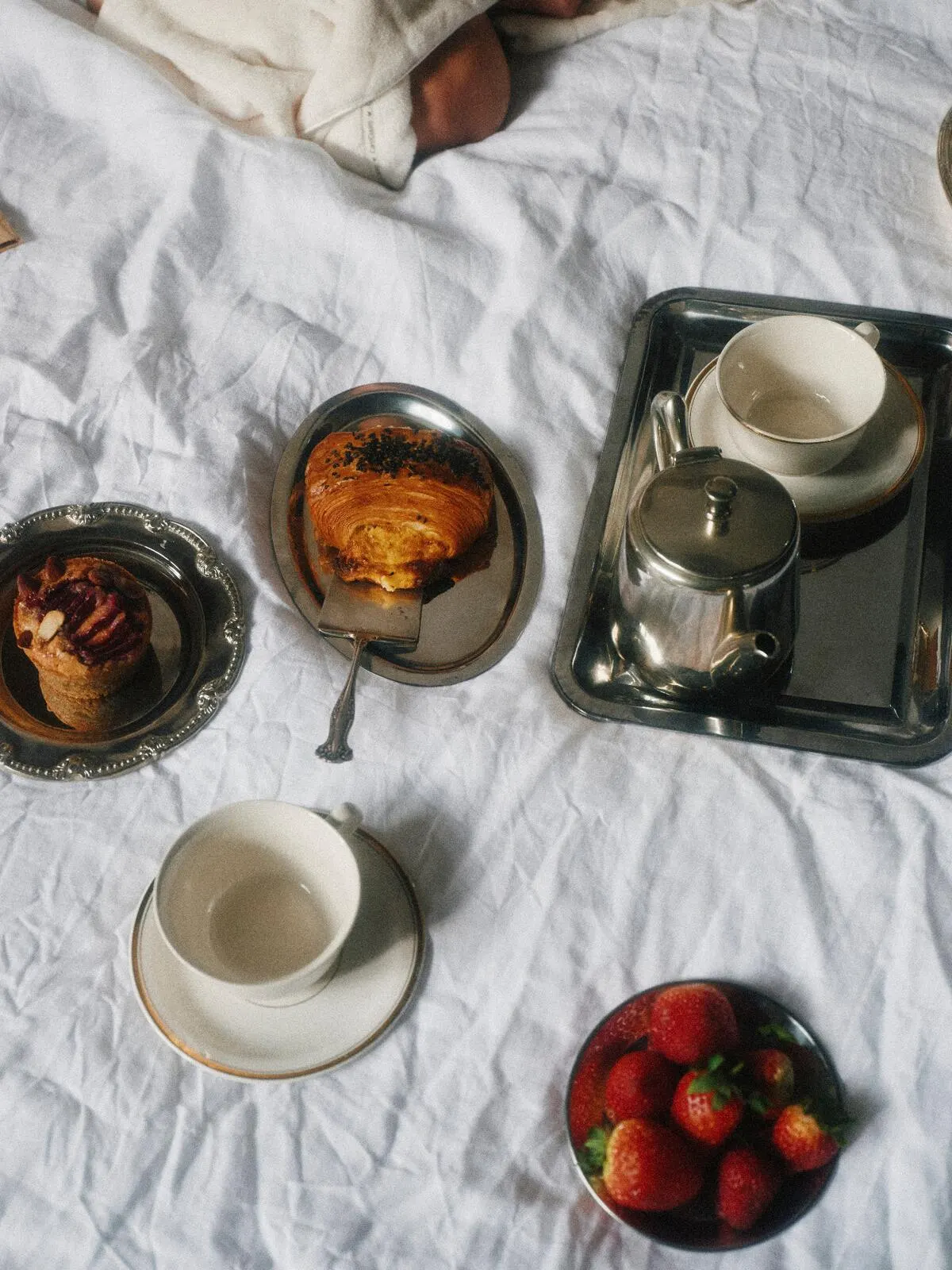 A breakfast tray someone else made, set down and waiting.